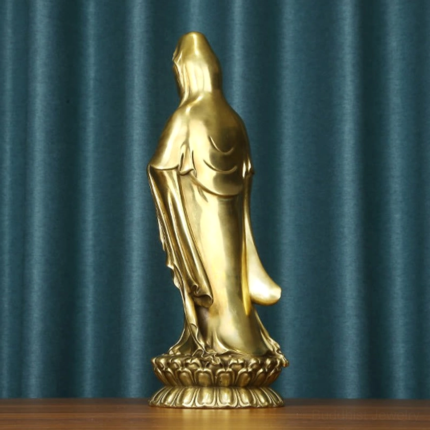Avalokitesvara brass statue intricate robe folds lotus pedestal golden bronze