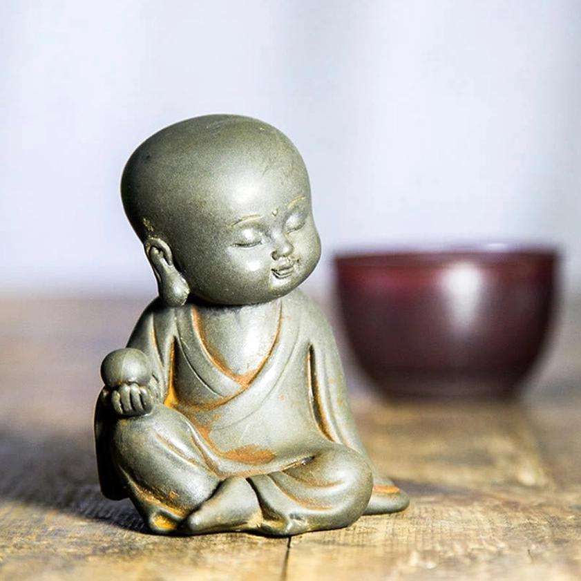 Avalokitesvara statue handcrafted resin bodhisattva figure rust patina close-up
