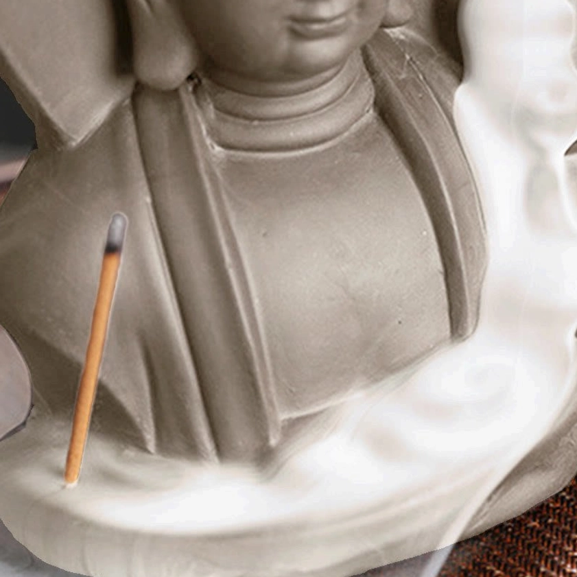 Avalokitesvara ceramic incense burner featuring dual incense slots and matte gray finish
