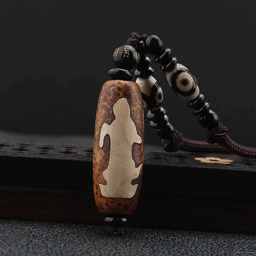 Avalokitesvara Dzi bead necklace pendant with Bodhisattva of compassion carving on hand-painted agate