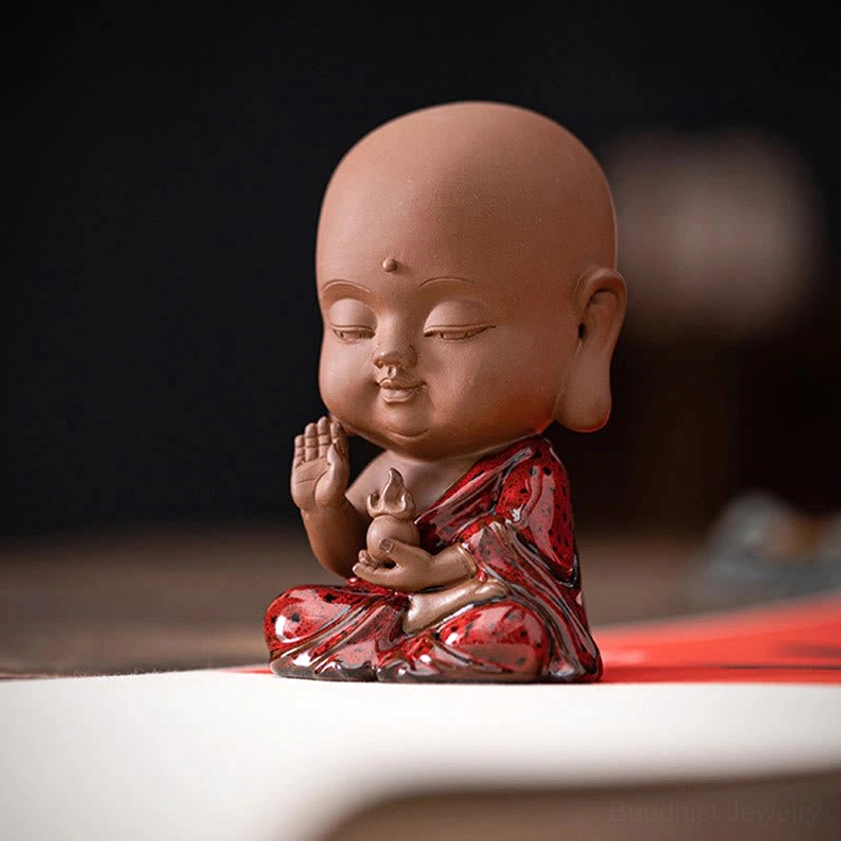 Avalokitesvara Guan Yin Buddhist miniature figurine ceramic statue symbolizing infinite compassion wealth harmony and protection from negative energy