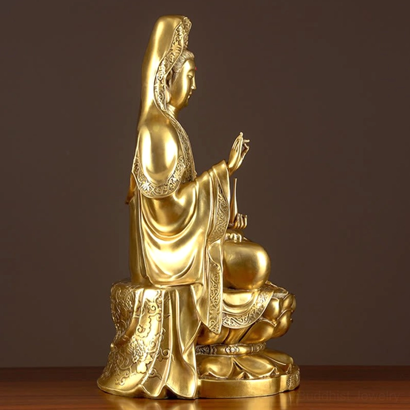 Guanyin Avalokitesvara statue right side view, shiny golden brass finish, blessing hand gesture, detailed lotus throne