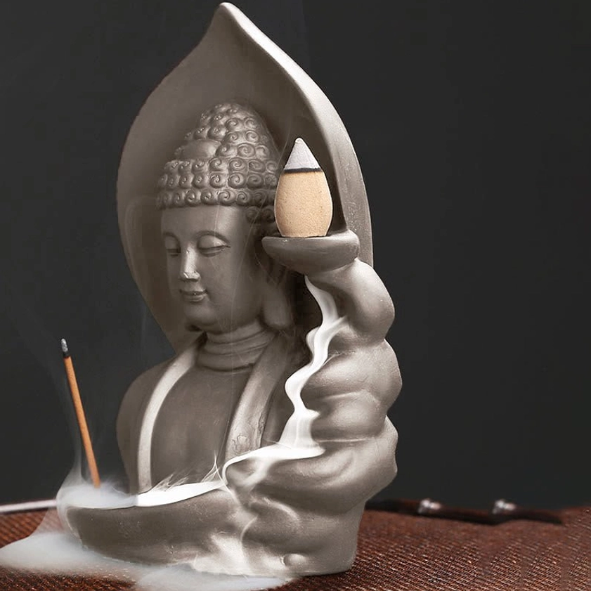 Buddhist incense holder featuring Avalokitesvara figure with flowing backflow smoke display