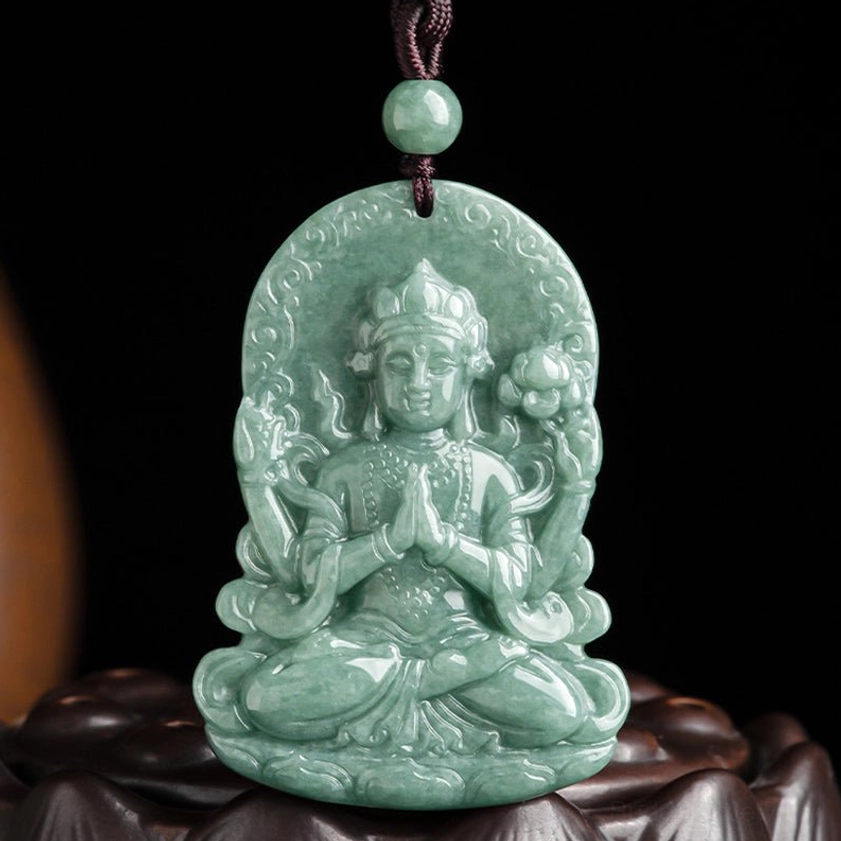 Natural jade Avalokitesvara pendant necklace detailed front view on display