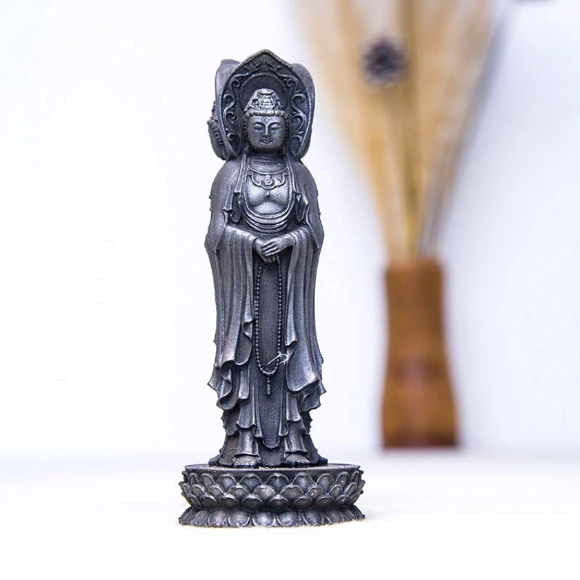 Three-sided Guan Yin statue meditation room setting for spiritual practice and compassion focus