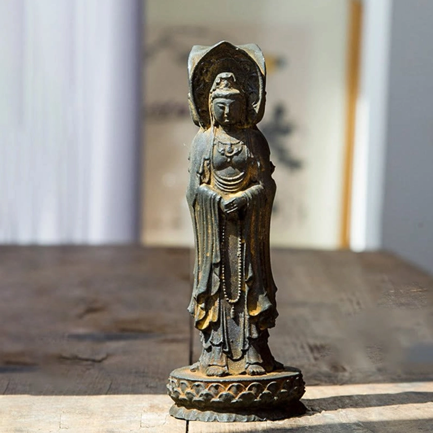 Three-sided Guan Yin Avalokitesvara statue front view cast resin with detailed Buddhist robes