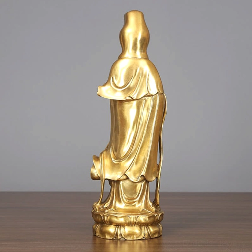 Rear view of golden Avalokitesvara brass statue showing draped robes and lotus base, complete back detail