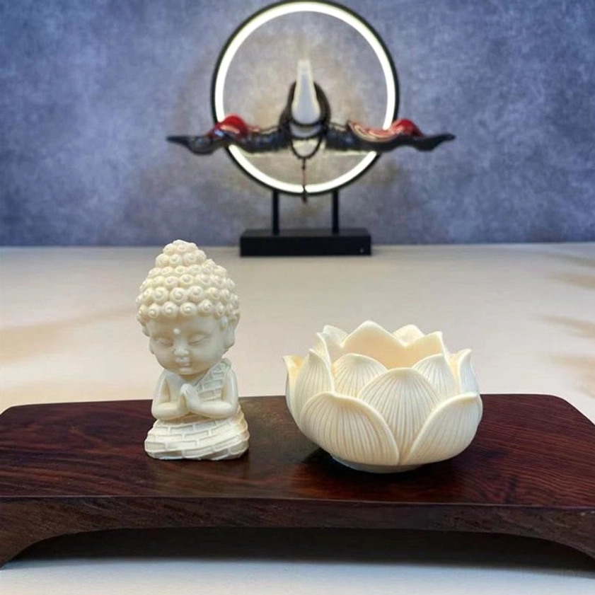 Baby Buddha seated in lotus vessel - compact ivory fruit Buddhist altar statue