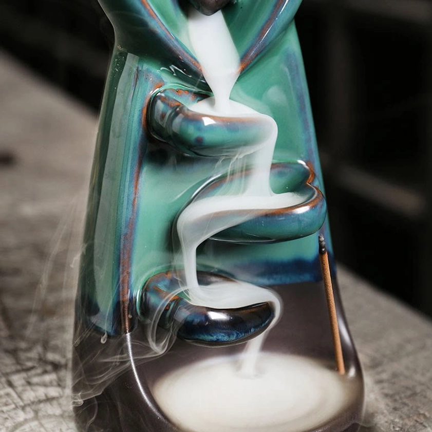 Layered ceramic backflow burner with cascading incense smoke and glazed finish