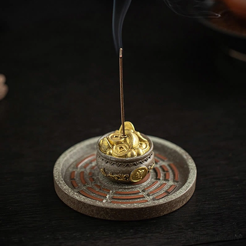 Direct front view of Bagua incense burner with full Bagua pattern tray, smoking incense, and gold treasure bowl