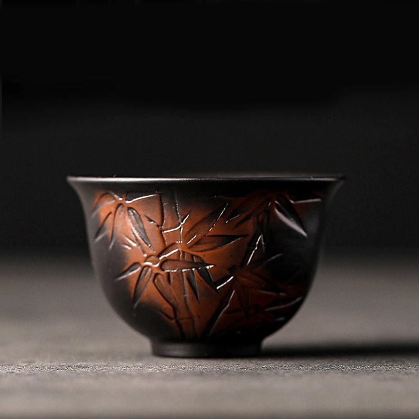 Bamboo embossed ceramic tea cup symbolizing flexibility and resilience for spiritual tea practice