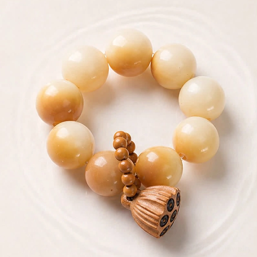 Gradient beige bodhi seed bracelet with smooth polished round beads and natural wooden lotus pendant