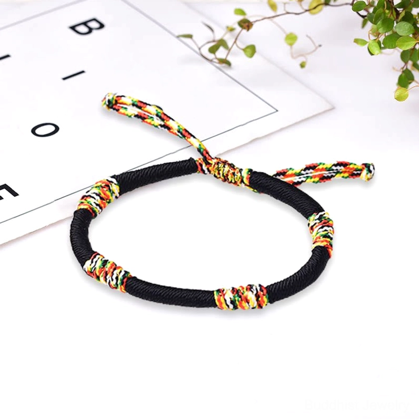 Black adjustable Buddhist bracelet with sliding knot closure featuring colorful sacred knot design