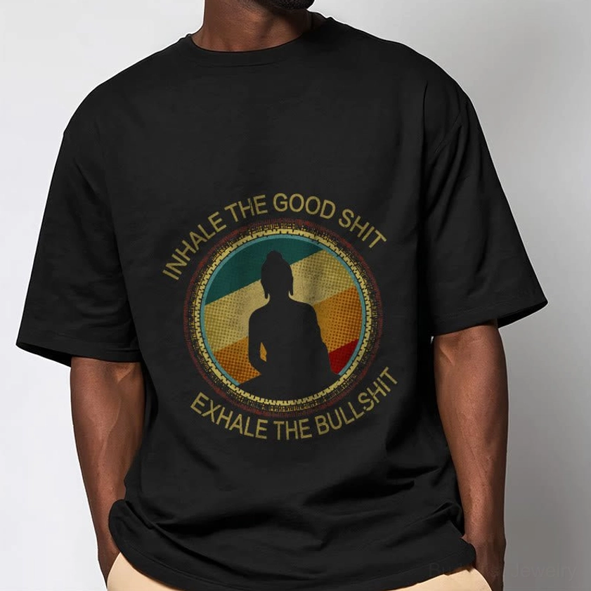 Male model wearing black mindfulness Buddha meditation t-shirt with white ink print, front view upper body