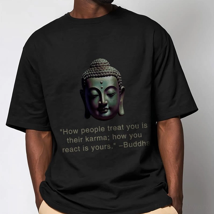 Black Buddhist philosophy t-shirt closeup worn on male model showing crew neck and graphic print