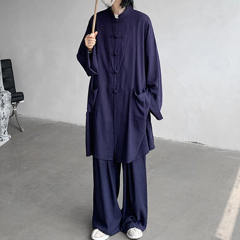 Black Buddhist meditation cotton wear back view showing shirt design and pants fit