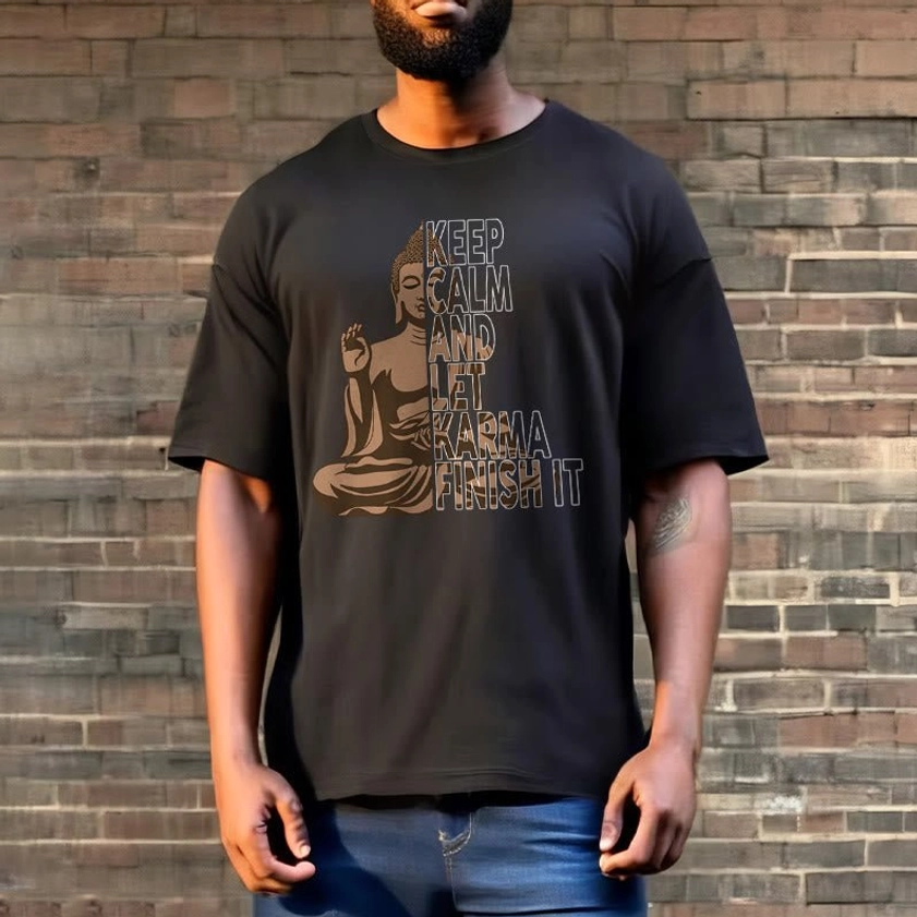 Charcoal black Buddhist karma tee worn with jeans brick wall background casual style