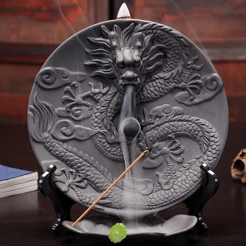 Black dragon ceramic incense burner side view with green stone accent and flowing backflow smoke