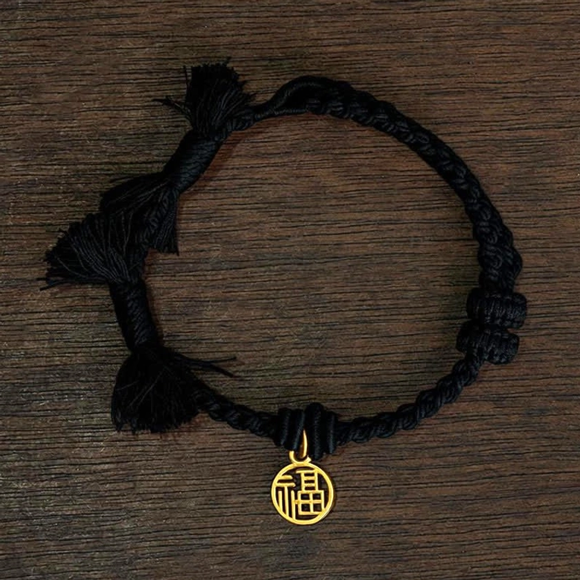 Black fu character bracelet with gold fortune charm on dark braided cord for spiritual protection