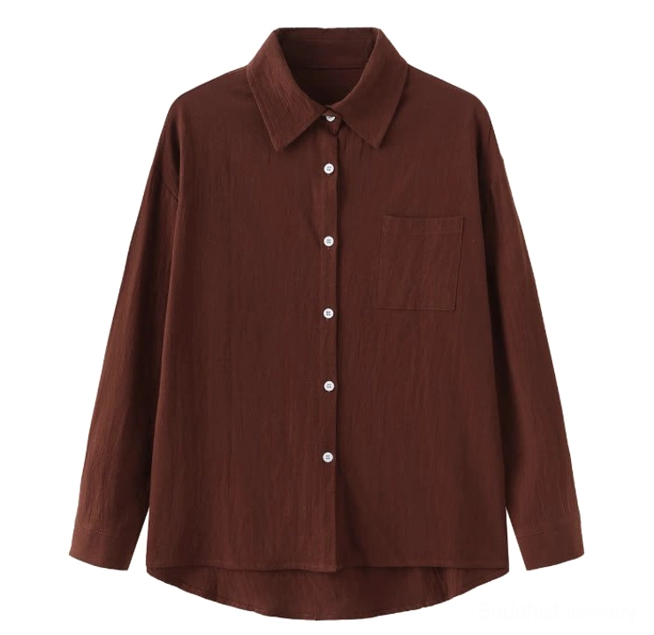 Black long-sleeve meditation shirt with collar pocket and relaxed fit