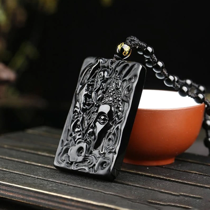 Black Obsidian Buddha Necklace with Gold Accent Bead - Low Angle View