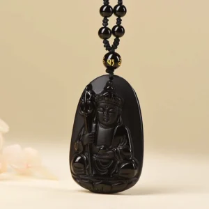 Black obsidian Buddha pendant necklace with beaded chain worn as spiritual protection jewelry