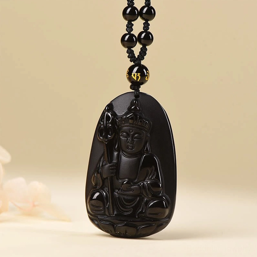 Black obsidian Buddha pendant necklace with beaded chain worn as spiritual protection jewelry