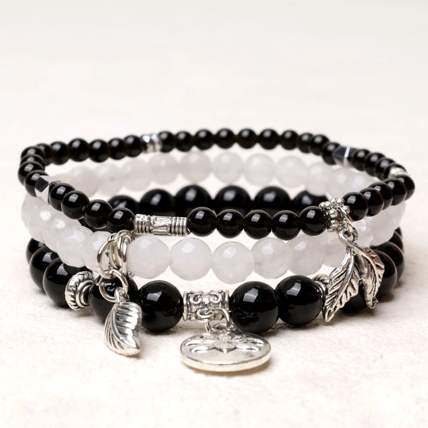 Black obsidian healing crystal bracelet with natural beads and silver charm pendant - handcrafted gemstone jewelry