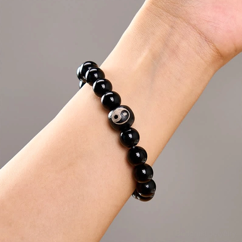 Handcrafted black obsidian onyx protection bracelet with yin yang symbol elastic string