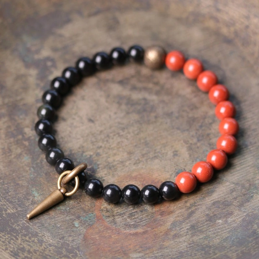 Black Obsidian and red stone beaded couples bracelet with bronze spike accent