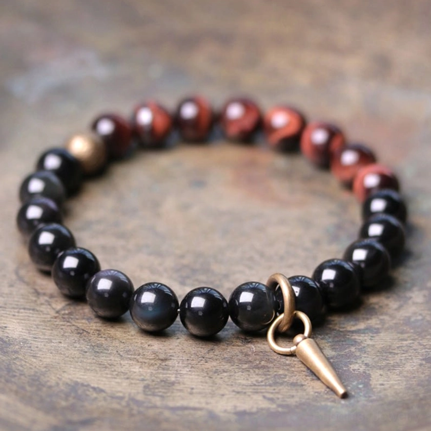 Black Obsidian and Red Tiger's Eye couples bracelet with bronze charm detail