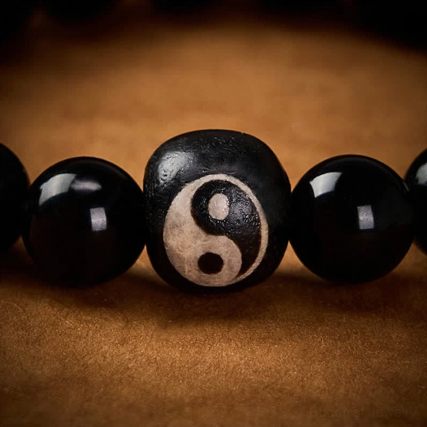 Natural black obsidian yin yang bracelet for meditation spiritual practice and chakra balance