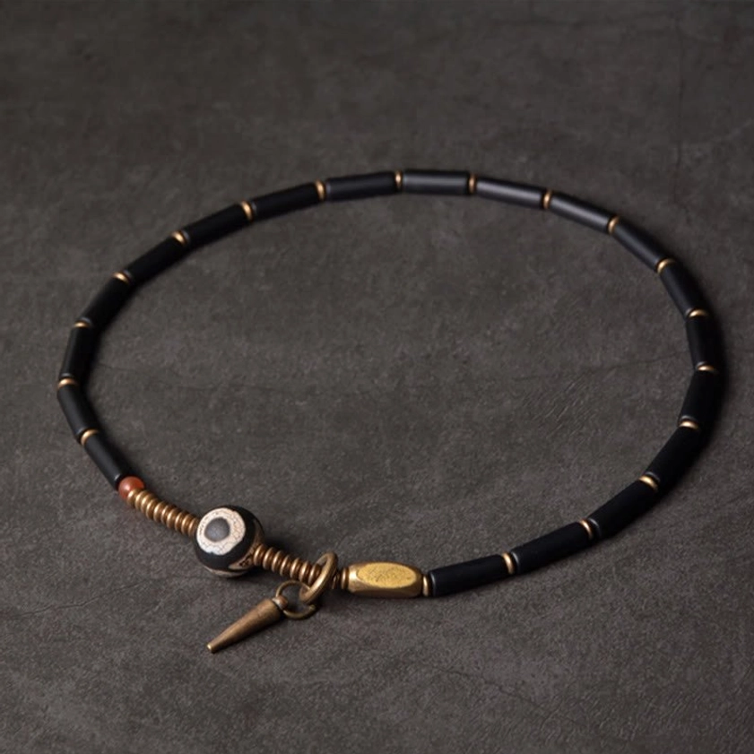 Black onyx Dzi bead double wrap protection bracelet displaying full product craftsmanship and design