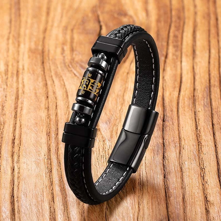 Black onyx mantra leather bracelet with hand-engraved Om Mani Padme Hum beads, protective spiritual jewelry close-up