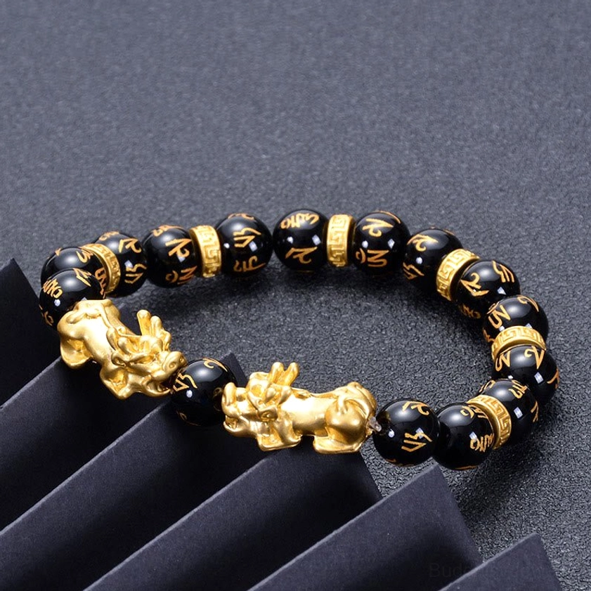 Black onyx Pixiu bracelet with engraved Om Mani Padme Hum beads and golden Pixiu charms detail