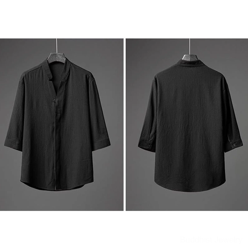Black textured shirt with stand collar and drawstring pants, detailed view showing button placket and pants waistband construction