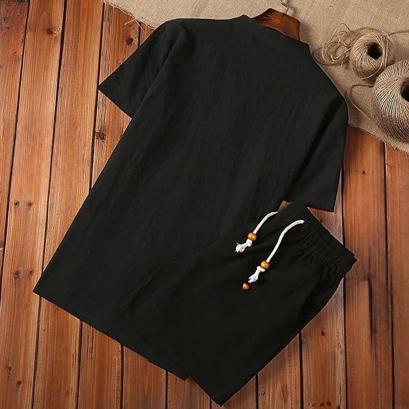 Black Tang suit pants back view showing short sleeve design and functional drawstring