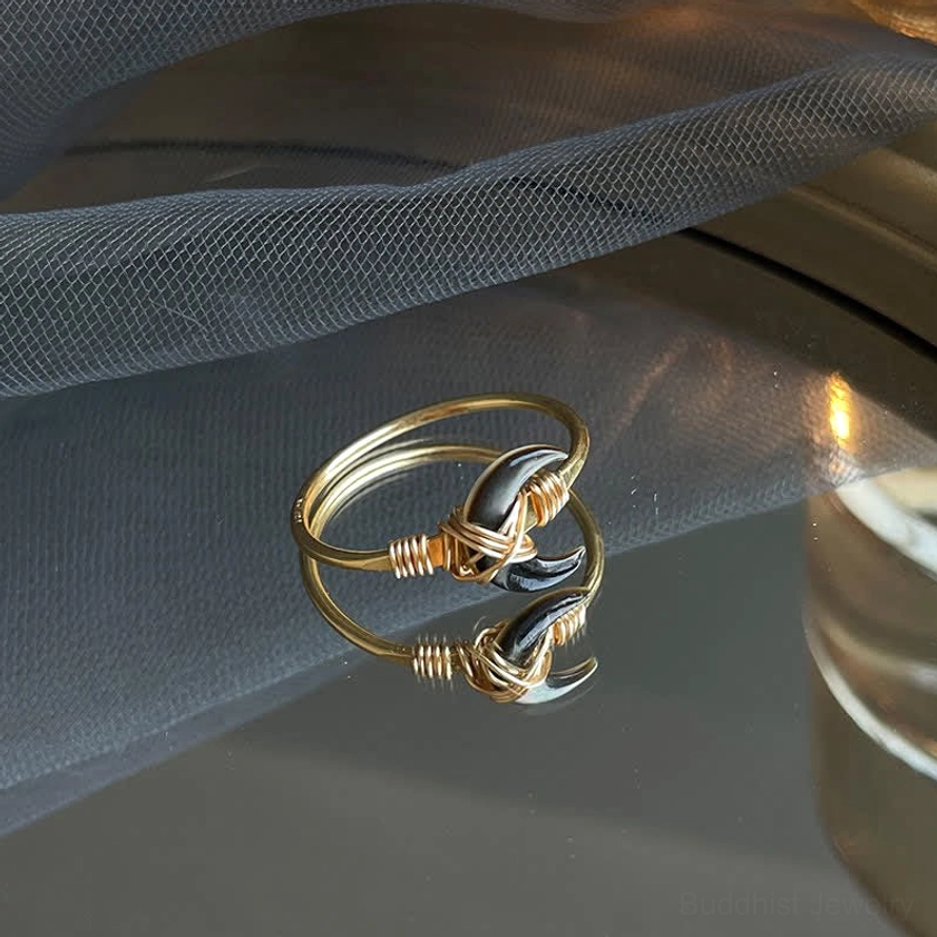 Black tridacna stone moon blessing ring detailed view, elegant crescent moon charm with 14K gold wrap