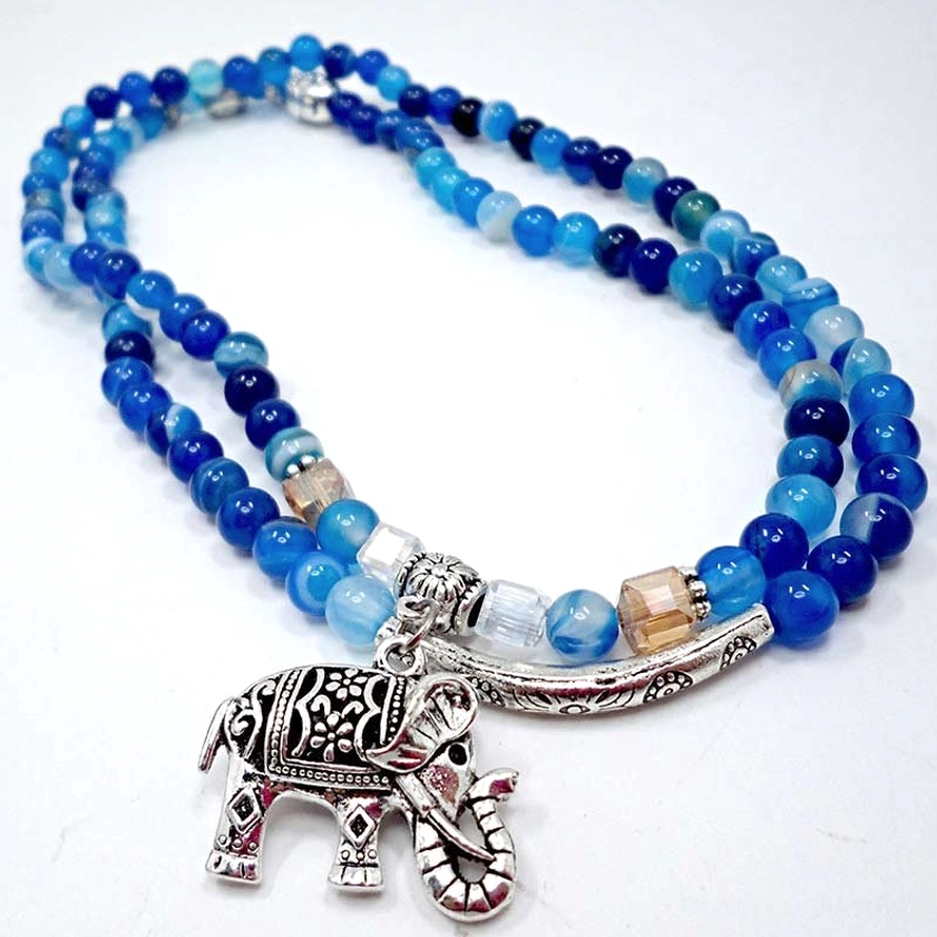 Blue Agate Elephant Buddhist Bracelet - Flat Lay with Crystal Spacer Beads and Silver Accents