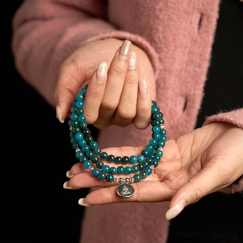Blue apatite 108 bead Buddhist mala bracelet with sterling silver charm pendant