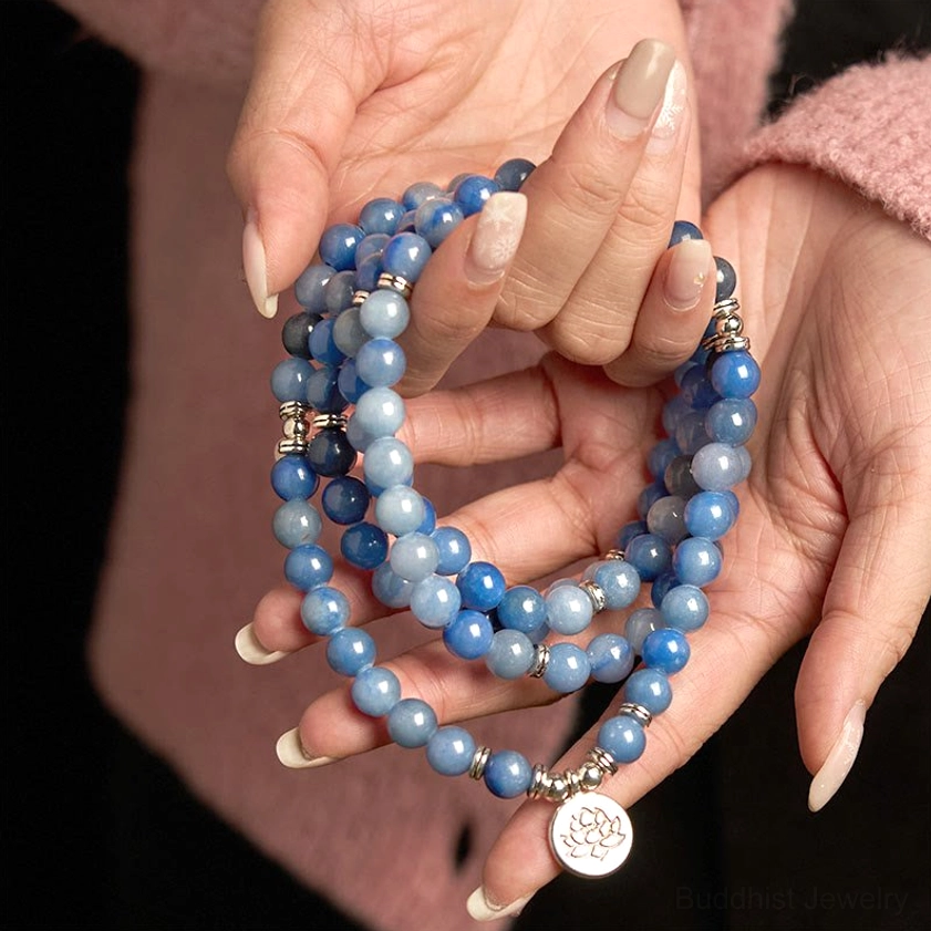 Multi-layer blue aventurine mala bracelet cupped in hands showing full bead strands