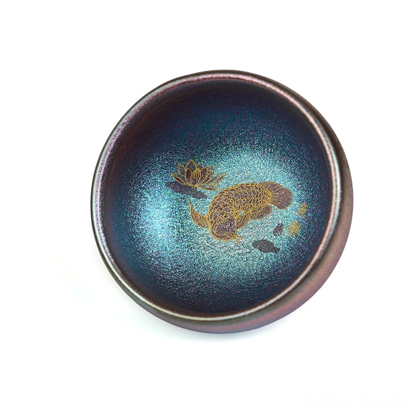 Blue gold koi fish lotus Jianzhan cup bottom view showing maker seal on white background