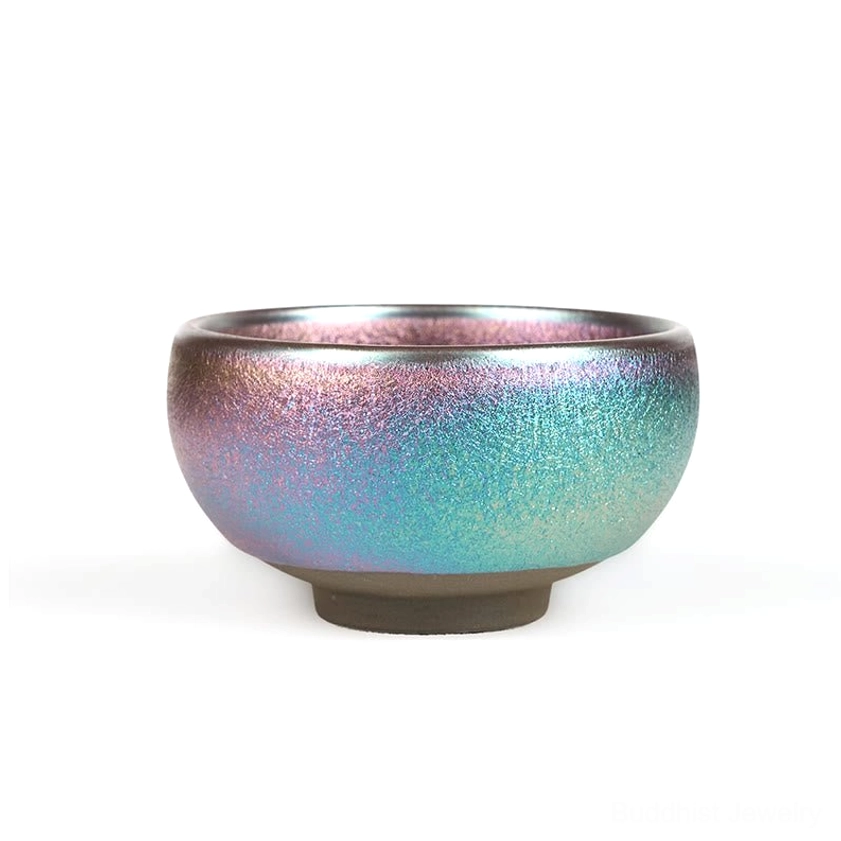 Blue gold color Jianzhan handmade tea cup with koi fish pattern detail shot
