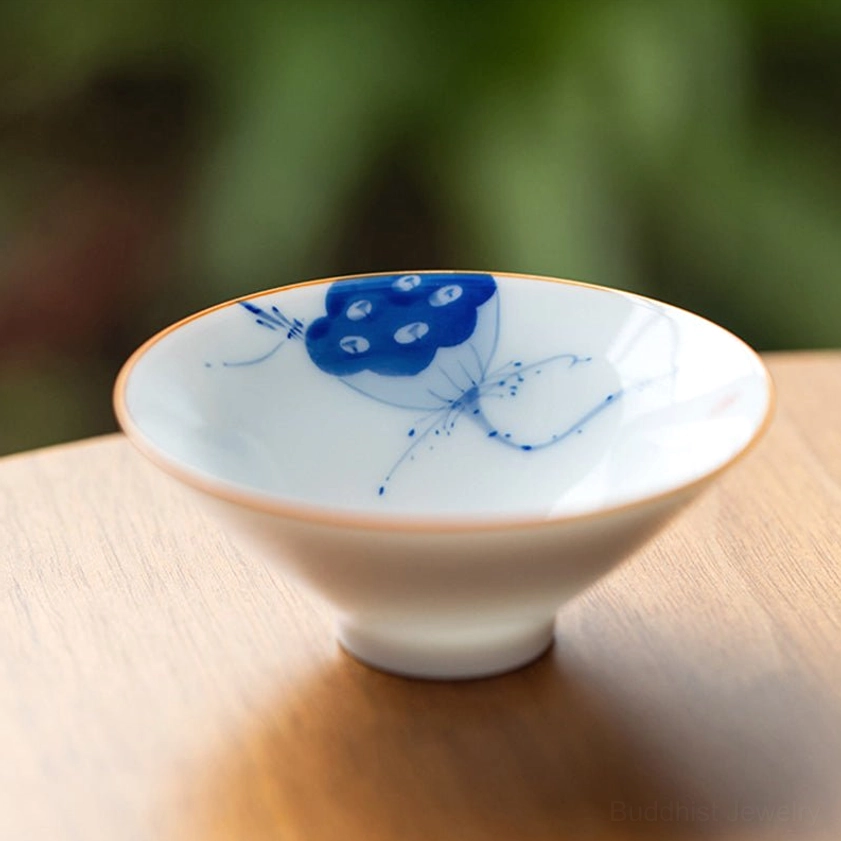 Blue hand-painted lotus flower porcelain teacup Buddhist enlightenment symbol ceramic
