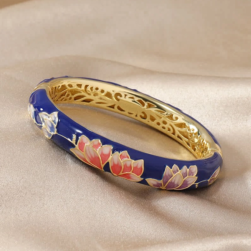 Dark blue cloisonné enamel lotus bangle with pink-purple lotus patterns and gold hollow inner frame, spiritual bracelet