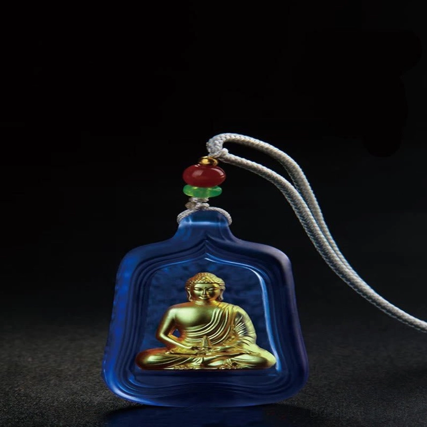 Blue Medicine Buddha pendant with braided gray cord, red-green accent beads, and gold Buddha inside frosted glass - side angle