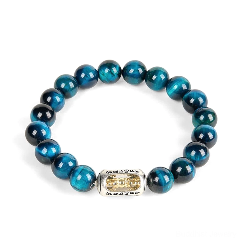 Full blue tiger eye bracelet laid flat showing neatly arranged round polished beads with central engraved spiritual charm
