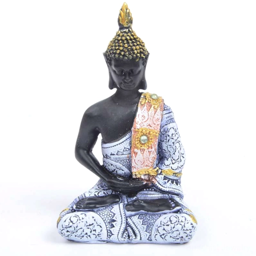Blue and white patterned Buddha statue with pink-gold sash and pearl accents, serene pose