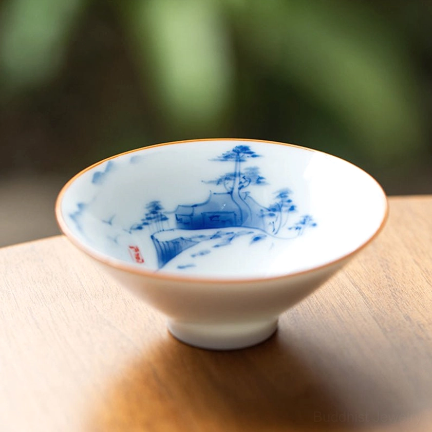 Blue and white porcelain teacup with traditional landscape painting design Buddhist tea ceremony cup