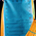 Blue Buddhist windhorse prayer flag with Tibetan mantras and sacred symbols displayed flat against black background